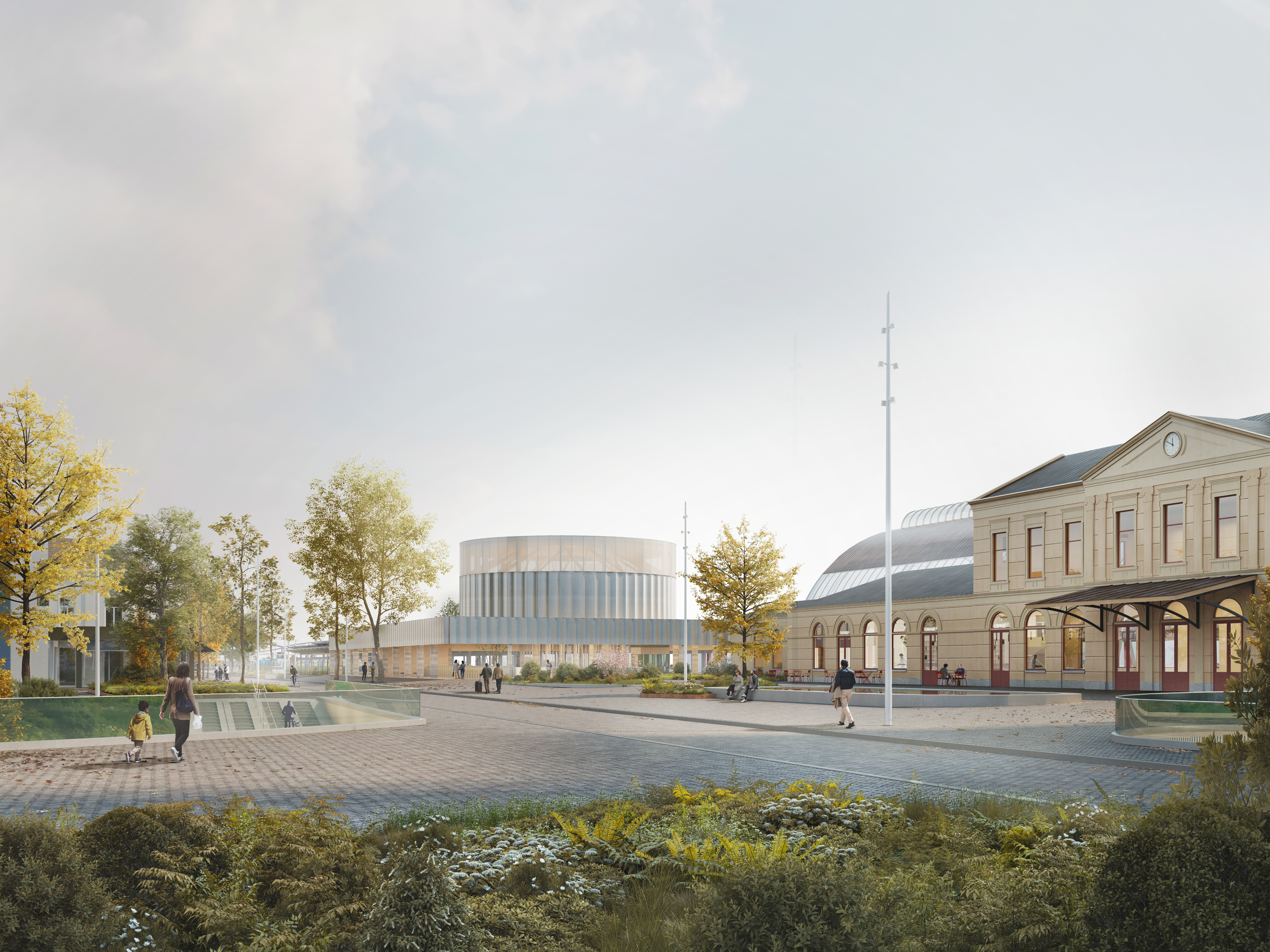 Met zijn hoge en lichte structuur doet de entree denken aan een sfeervolle lantaarn die zowel overdag als 's avonds het station tot leven brengt