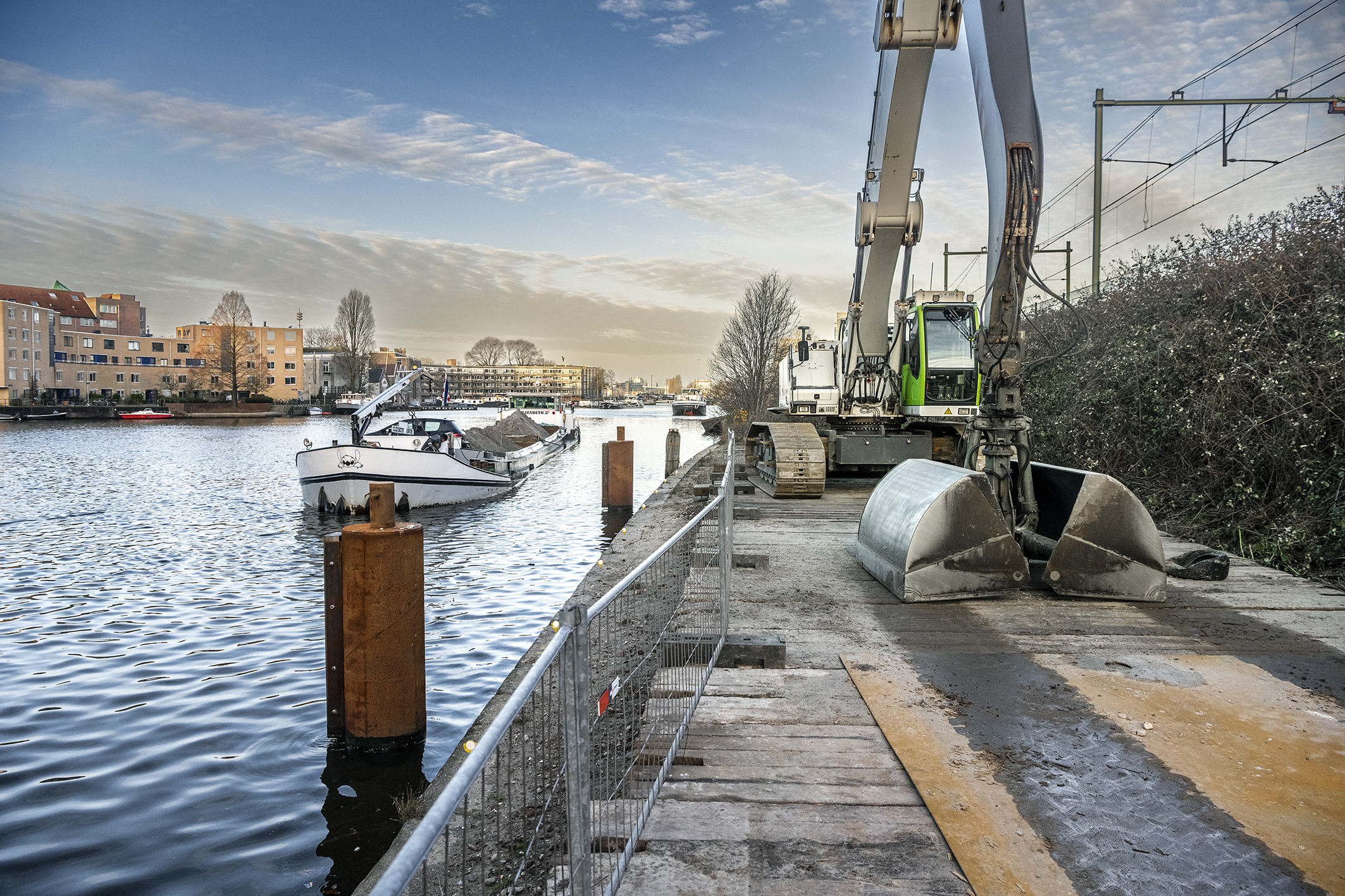 Aanvoer van zand via het water